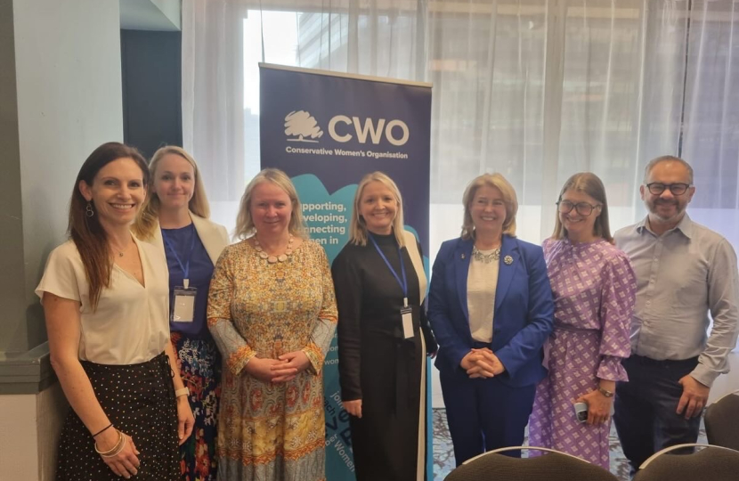 Aphra with fellow panelists at the CWO Conference