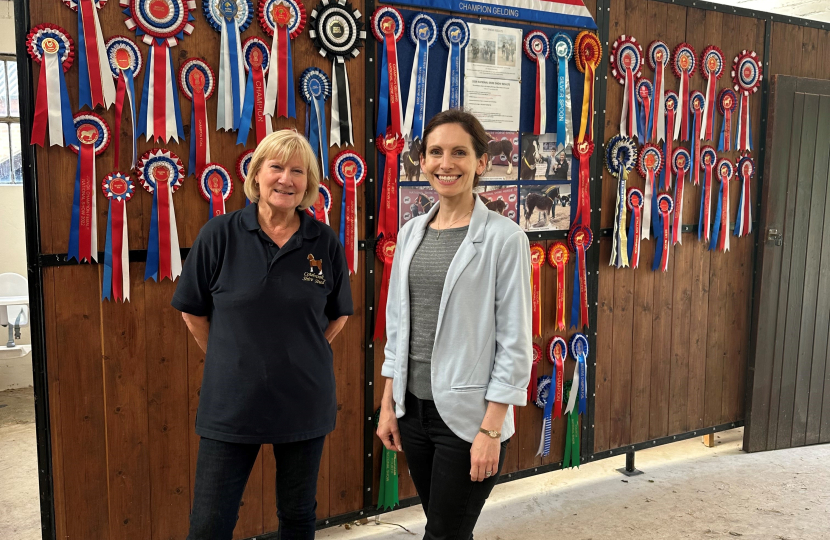 Aphra Brandreth MP with Janet King and Cotebrook's many prizes.