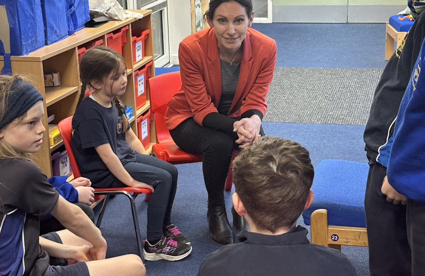 Aphra Brandreth MP talking with Huxley C of E School pupils