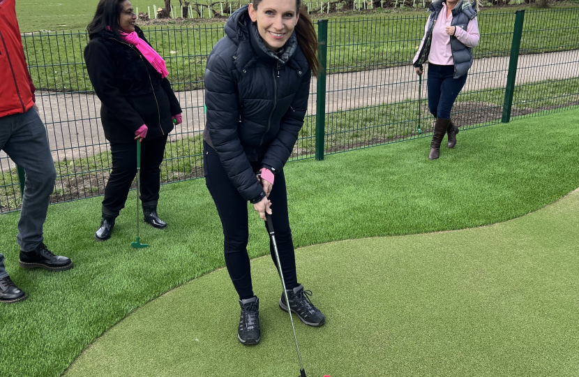 Aphra playing mini golf