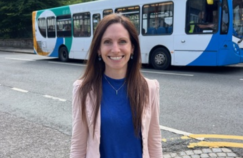 Aphra Brandreth MP with a Stagecoach bus