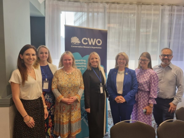 Aphra with fellow panelists at the CWO Conference