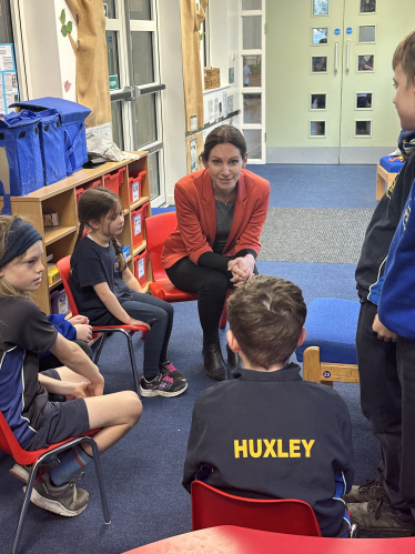 Aphra Brandreth MP talking with Huxley C of E School pupils