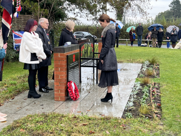 Aphra laying a wreath for Remembrance Sunday