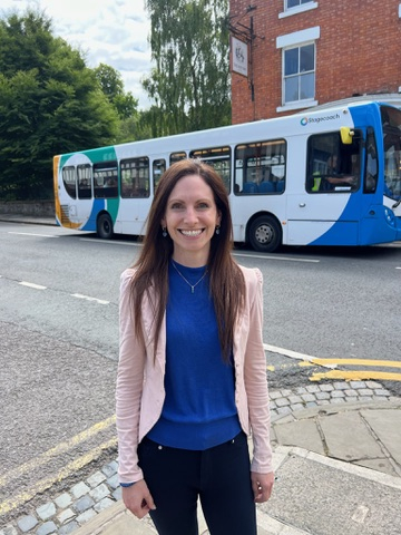 Aphra Brandreth MP with a Stagecoach bus